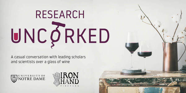 Research Uncorked logo featuring a U filled with red wine and an O with a corkscrew through it