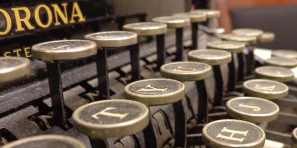 closeup of the keys on an antique typewriter