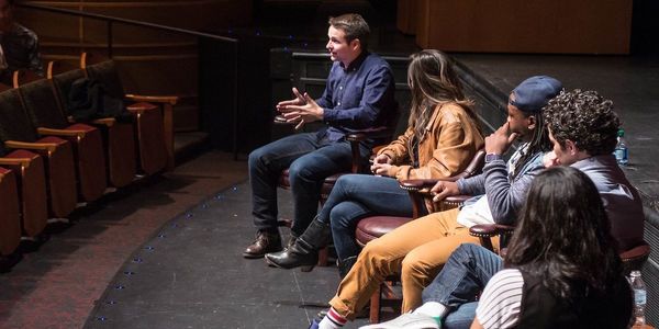 Patrick Vassel (left), Hamilton cast members Ari Afsar and Chris De'Sean Lee, and director Tommy Kail visit with Film, Television and Theatre majors